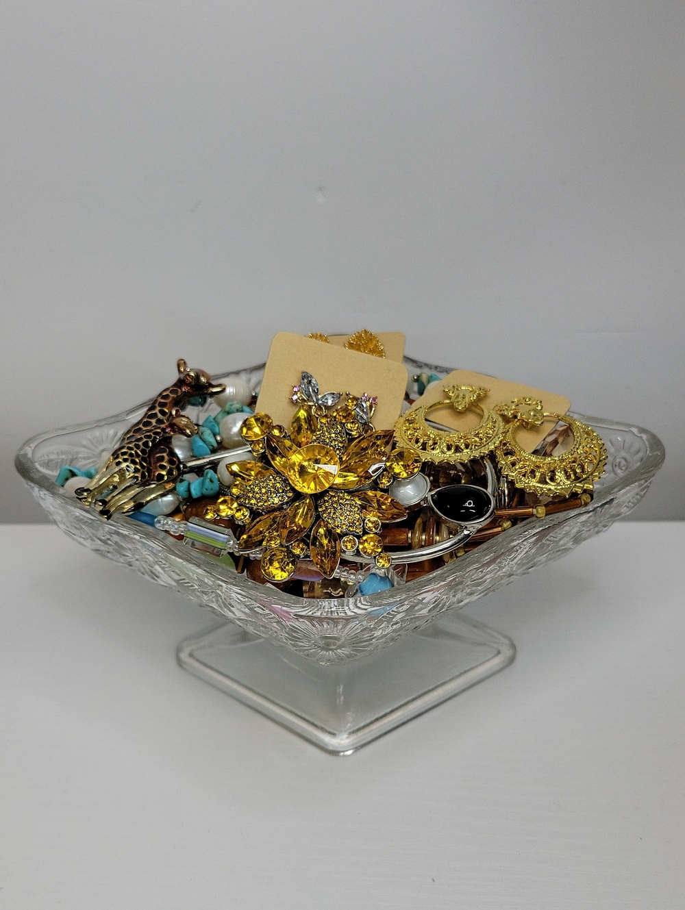 Glass Dish Filled With Jewelry